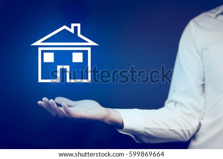 man hand blue house model  in screen