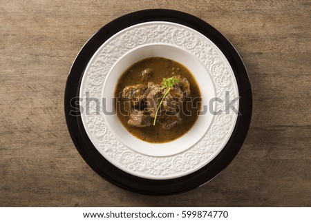 Rustic Stew meat with sauce in the white plate