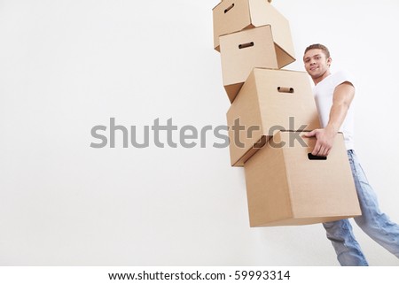 A young man with a cardboard box Royalty-Free Stock Photo #59993314