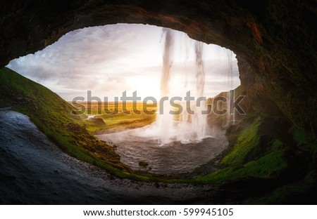 Perfect view of famous powerful Seljalandsfoss waterfall in sunlight. Dramatic and gorgeous scene. Popular tourist attraction. Location place Iceland, sightseeing Europe. Discover the world of beauty
