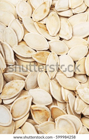 Pumpkin seed texture. Pumpkin seeds pattern as background.