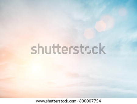 Sunshine clouds sky during morning background. Blue,white pastel heaven,soft focus lens flare sunlight. Abstract blurred cyan gradient of peaceful nature. Open view out windows beautiful summer spring Royalty-Free Stock Photo #600007754