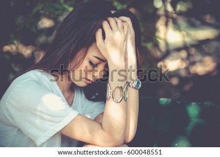 The woman is in the mood for something. emotion, vintage style. Royalty-Free Stock Photo #600048551