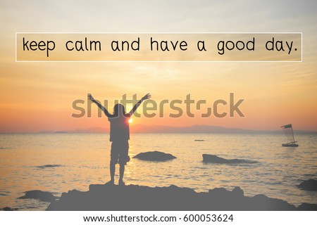 keep calm and have a good day, quote word in blurred sunset over the sea background and Silhouette of a boy with hands raised on a beach at  the sunset concept for religion, worship,prayer and praise.