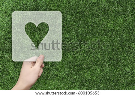 Heart symbol message box with green grass background