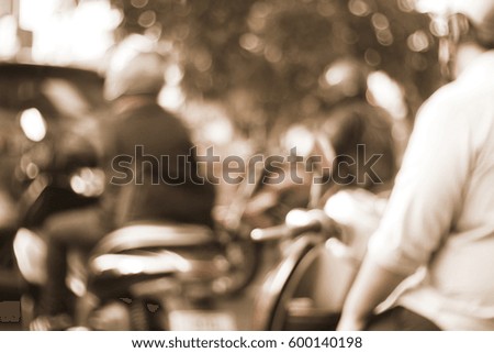 Blurred  background abstract and can be illustration to article of Man seat on the motorcycle