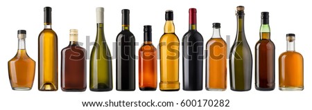 Set of wine and brandy bottles. isolated on white background Royalty-Free Stock Photo #600170282