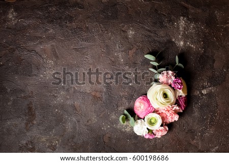 Floral round frame with  eucalyptus branches and leaves, flat lay flowers, top view with copy space