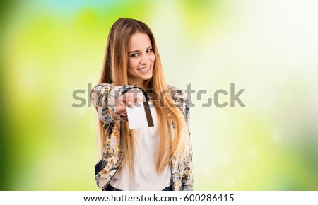 pretty young woman using a credit card