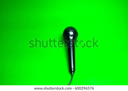 microphone Green paper texture background