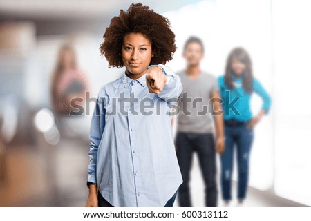 young black woman pointing front