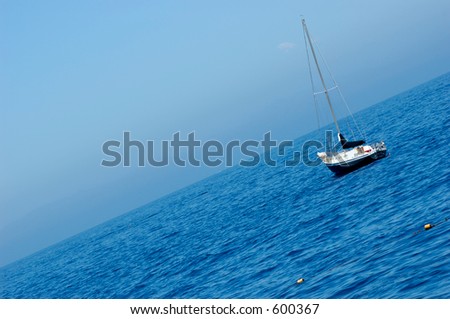 Small boat floating peacefully outside Santa Catalina Island in Southern California.