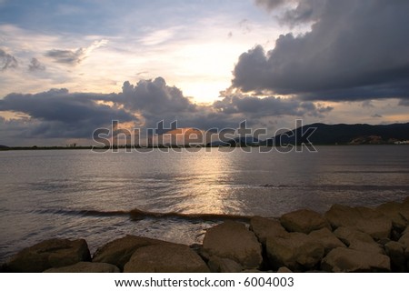 The picture of sunset viewed from sea shore