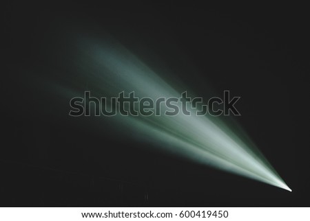 projector light rays in the dark Royalty-Free Stock Photo #600419450