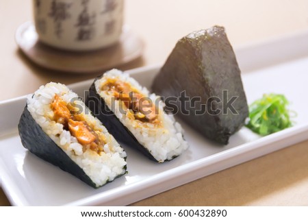 Onigiri, rice ball wrapped with seaweed, Japanese food Royalty-Free Stock Photo #600432890