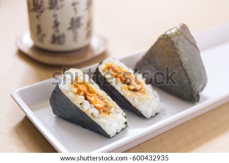 Onigiri, rice ball wrapped with seaweed, Japanese food Royalty-Free Stock Photo #600432935