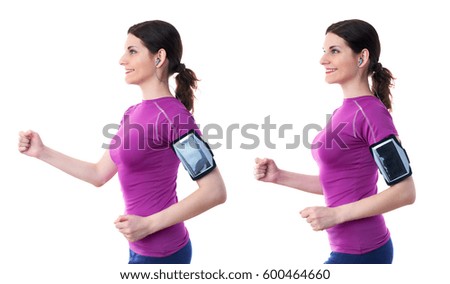 Smilling and moving, running sporty woman in violet T-short with smart phone device and headphones over white isolated background, fitness, sport and lifestyle concept