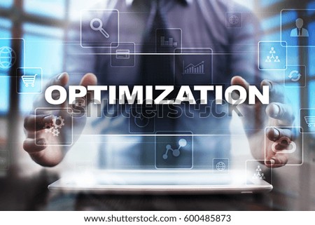 Businessman using tablet pc and selecting optimization.