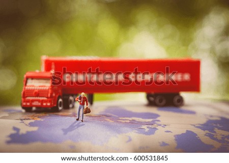 Miniature people businessman on trailer background