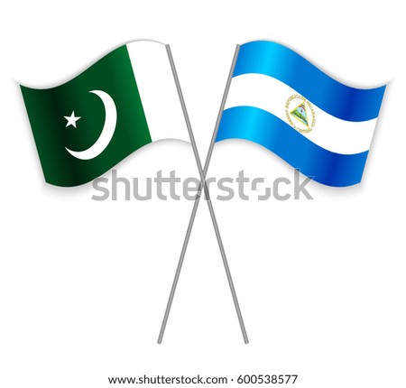 Pakistani and Nicaraguan crossed flags. Pakistan combined with Nicaragua isolated on white. Language learning, international business or travel concept.