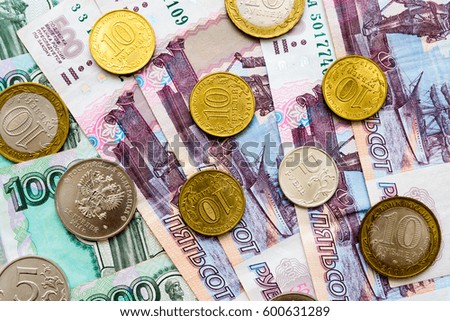 Russian money background. Rubles banknotes and coins. closeup