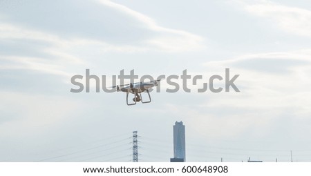 Drone fly in the blue sky