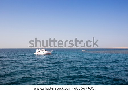 White private yacht floating on the red sea