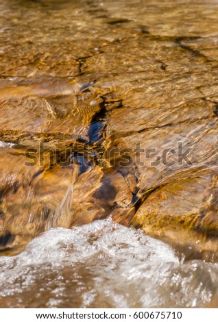 rocky bottom of a stream - background