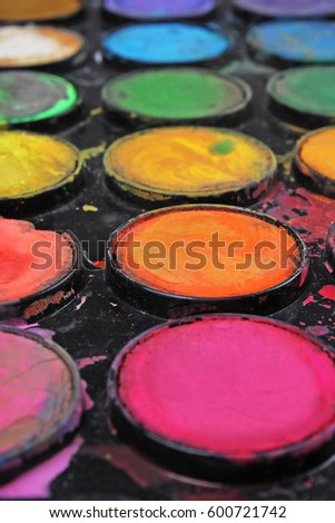 Watercolor used paint palette. Used palette can illustrate creative art work or any other concept.