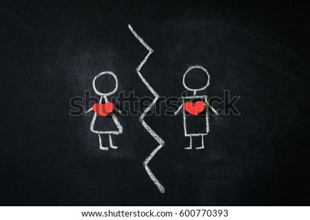 A girl and a boy drawn on a blackboard representing break up Royalty-Free Stock Photo #600770393
