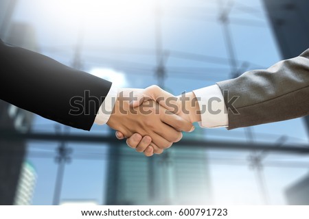 M&A (MERGERS AND ACQUISITIONS) , Businessman handshake working at office M&A Royalty-Free Stock Photo #600791723