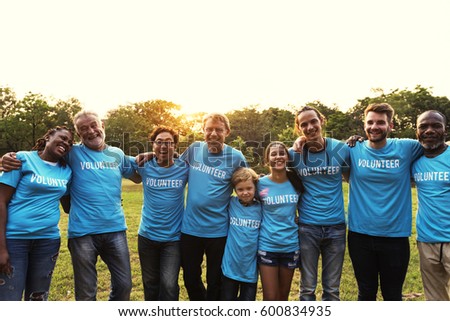 Voluteer group of people for charity donation in the park Royalty-Free Stock Photo #600834935