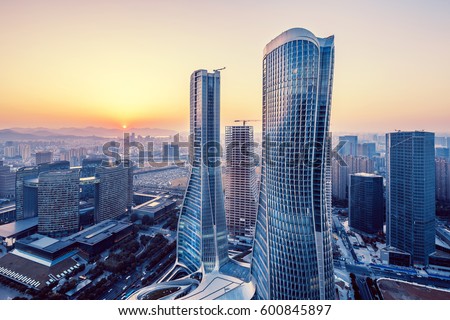 modern buildings in midtown of hangzhou new city at sunrise Royalty-Free Stock Photo #600845897