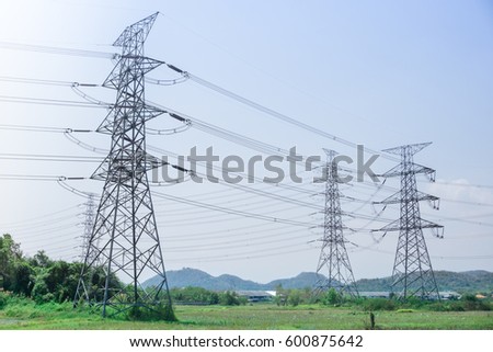 electricity transmission pylon / High-voltage electric tower with sky background.