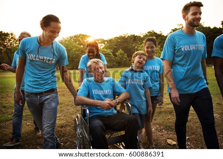volunteer group of people for charity donation in the park Royalty-Free Stock Photo #600886391