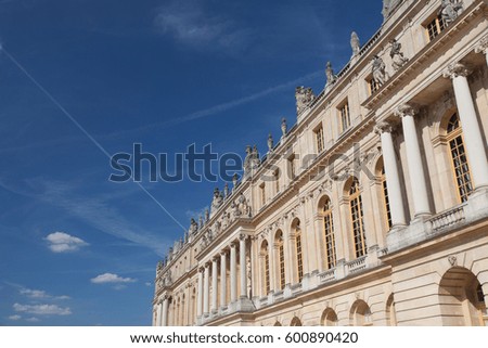 A corner of Palace of Versailles with blue sky background