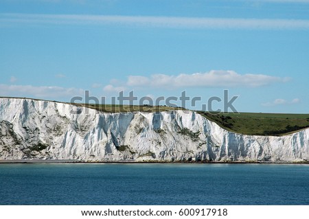 chalk cliffs at the coast of england/white cliffs of Dover/coastal landscape Royalty-Free Stock Photo #600917918