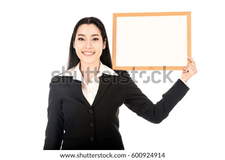 women holding a blank sign