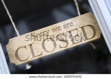 Closeup of Closed Sign on Shop Door