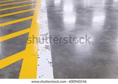 Yellow line on parking concrete floor,do not parking over this sign.