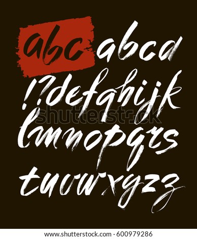 Vector Acrylic Brush Style Hand Drawn Alphabet Font. Calligraphy alphabet on a black background. ABC for your design, brush lettering