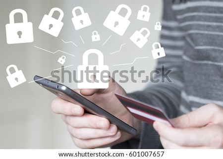 Businessman on phone confirms lock security purchase credit card