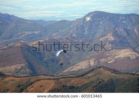 flying man over the hills