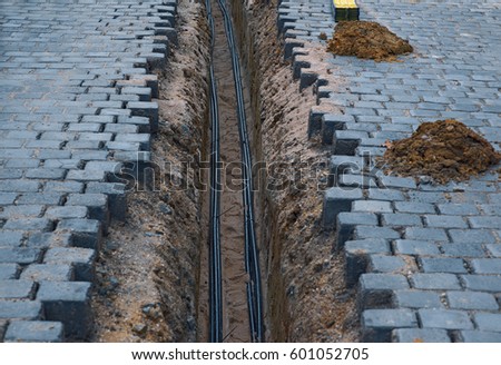 cable laying Royalty-Free Stock Photo #601052705