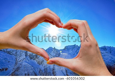 Mountain tourism. Symbol of love. In love with mountains