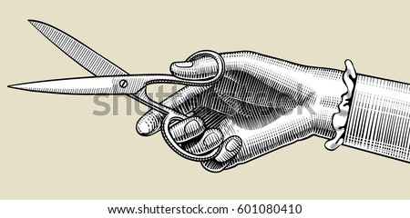 Woman's hand with scissors. Vintage engraving stylized drawing. Vector illustration