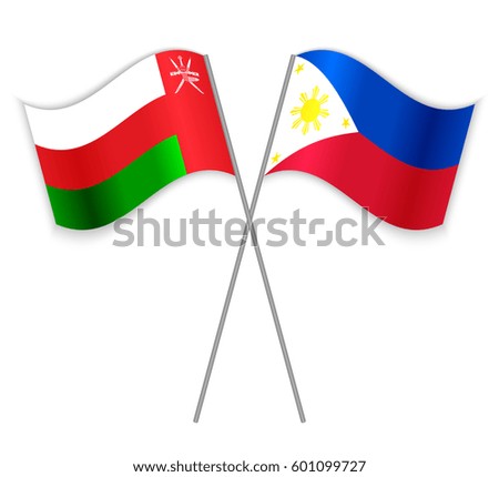 Omani and Filipino crossed flags. Oman combined with Philippines isolated on white. Language learning, international business or travel concept.