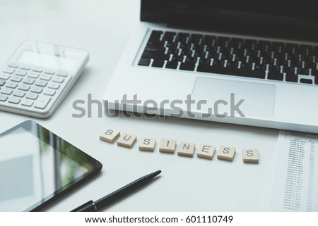 Business crossword on business working table. Business background concept.