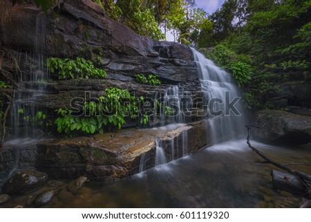 The fresh water flowing at the Candi Merbok Waterfall, located in Kedah, Malaysia
