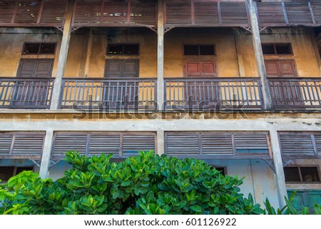 Antique building wall and windows in  Thailand